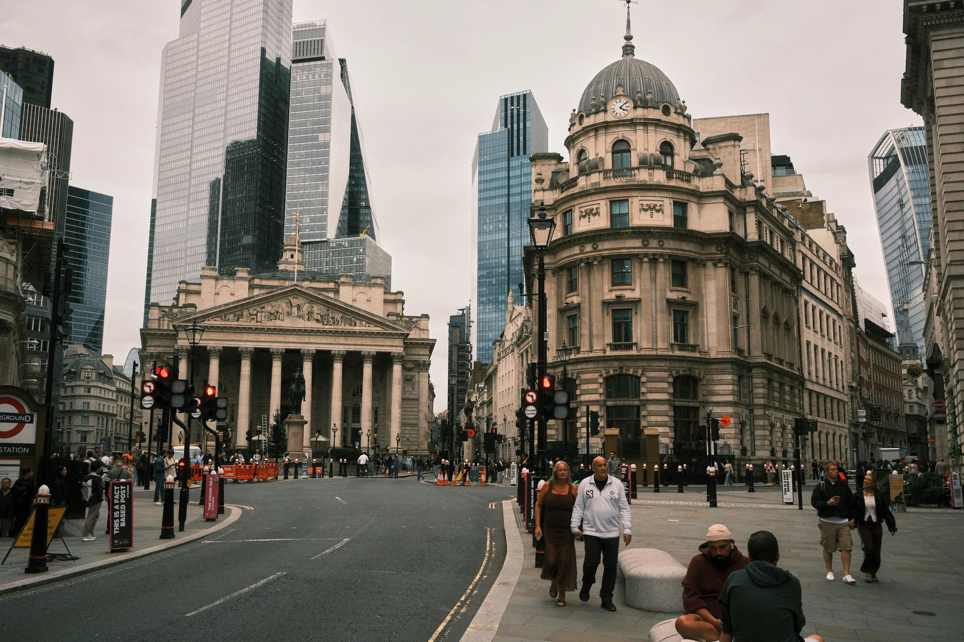 Bank of England building and surrounding City of London financial district streets.